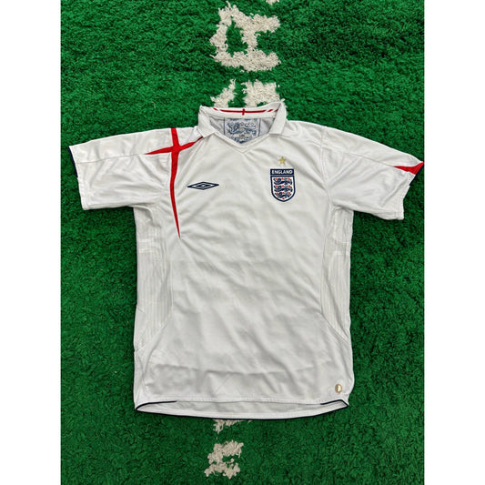 England Home Shirt 2006-2008 L 7/10 by KershKits in Clothing. Available at KershKicks for £45.00. A must-have for fans of KershKits looking to elevate their style with this Kits.