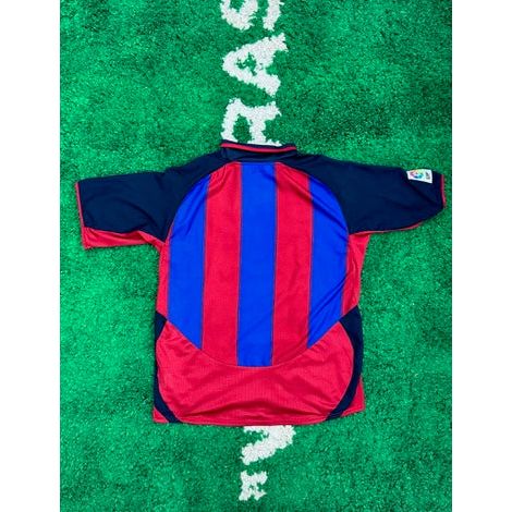 Barcelona Home Shirt 2003-2004 XL by KershKits in Clothing. Available at KershKicks for £70.00. A must-have for fans of KershKits looking to elevate their style with this Kits.