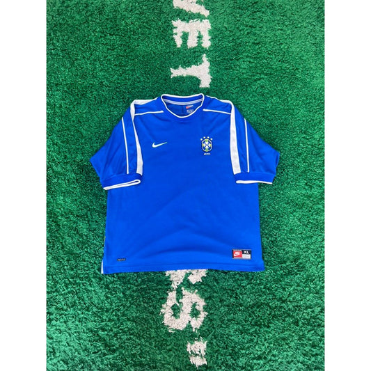 BRAZIL 1998/00 Away Nike Football Jersey XL by KershKits in Clothing. Available at KershKicks for £99.00. A must-have for fans of KershKits looking to elevate their style with this Kits.