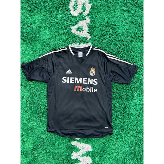 Real Madrid Away Shirt 2004-2005 M by KershKits in Clothing. Available at KershKicks for £85.00. A must-have for fans of KershKits looking to elevate their style with this Kits.