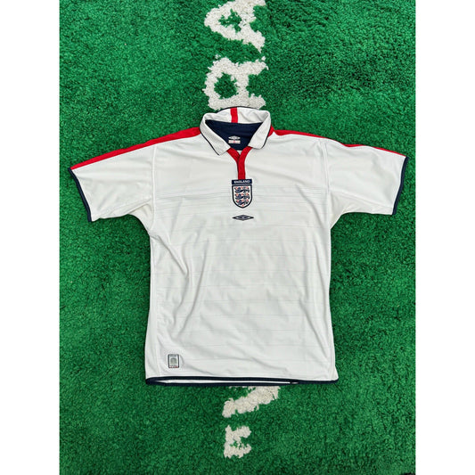 England Home Shirt 2004 L by KershKits in Clothing. Available at KershKicks for £45.00. A must-have for fans of KershKits looking to elevate their style with this Kits.