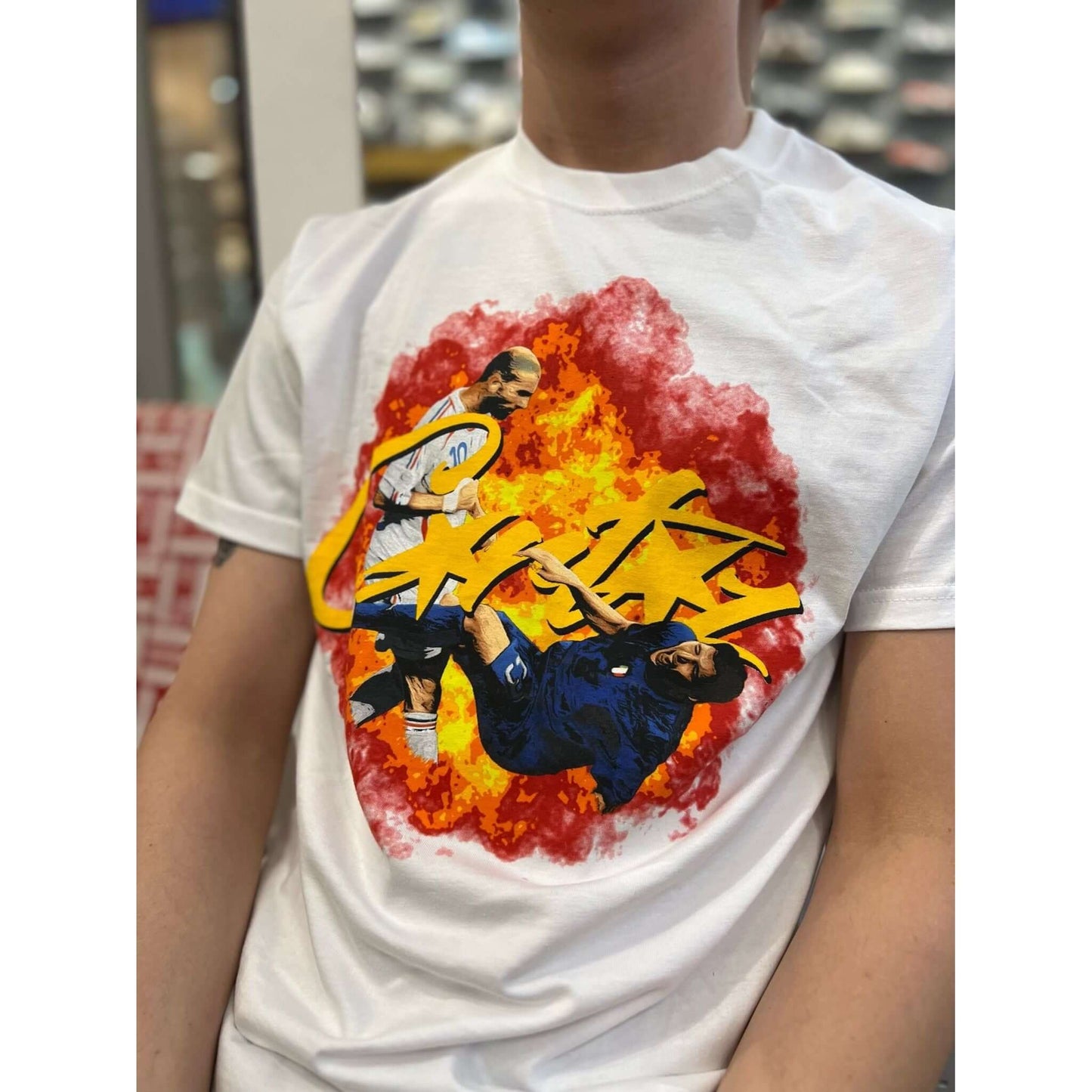 Corteiz Zizou Tee - White by Corteiz in . Available at KershKicks for £85.00. A must-have for fans of Corteiz looking to elevate their style with this T-Shirt.