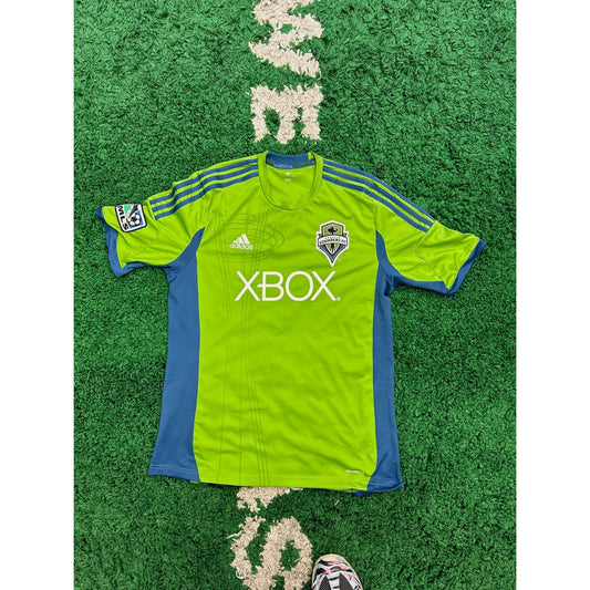 Seattle Sounders FC Home Shirt 2013/14 L 8/10 by KershKits in . Available at KershKicks for £60.00. A must-have for fans of KershKits looking to elevate their style with this Kits.