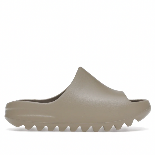 Yeezy Slide Pure (Kids) by Adidas in Shoes. Available at KershKicks for £90.00. A must-have for fans of Adidas looking to elevate their style with this Kids Trainers.