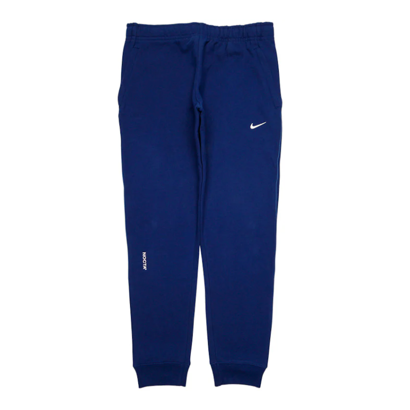 Nocta Cardinal Stock Fleece Pants Navy by Nike in Uncategorized. Available at KershKicks for £100.00. A must-have for fans of Nike looking to elevate their style with this Sweatpants.