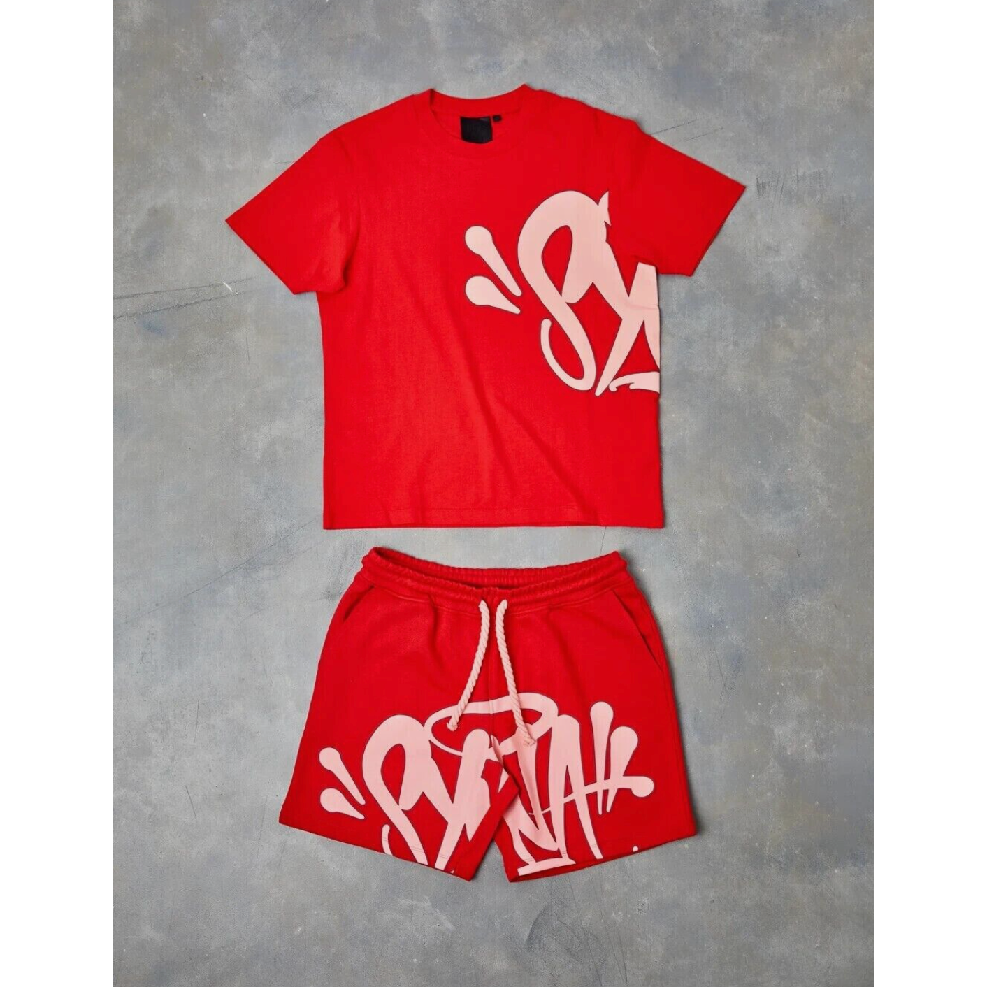 SYNA WORLD LOGO T SHIRT + SHORT SET - RED by SYNA in . Available at KershKicks for £235.00. A must-have for fans of SYNA looking to elevate their style with this T-Shirt.