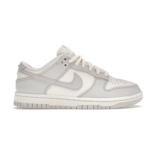 Nike Dunk Low Needlework Sail Aura (Women's) by Nike in Shoes. Available at KershKicks for £195.00. A must-have for fans of Nike looking to elevate their style with this Shoes.