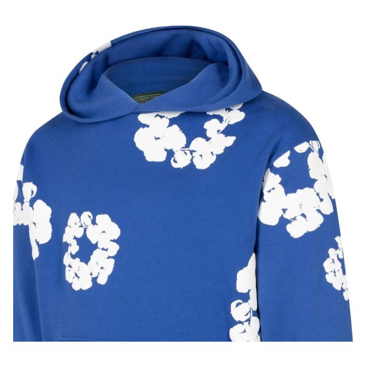 Denim Tears The Cotton Wreath Sweatshirt Royal Blue by Denim Tears in Uncategorized. Available at KershKicks for £350.00. A must-have for fans of Denim Tears looking to elevate their style with this Hoodie.