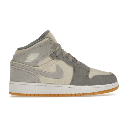 Jordan 1 Mid SE Coconut Milk Particle Grey (GS) by Jordan's in Shoes. Available at KershKicks for £110.00. A must-have for fans of Jordan's looking to elevate their style with this Shoes.