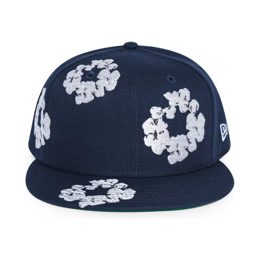 Denim Tears New Era Cotton Wreath 59/50 Cap Navy by Denim Tears in . Available at KershKicks for £135.00. A must-have for fans of Denim Tears looking to elevate their style with this Accessories.