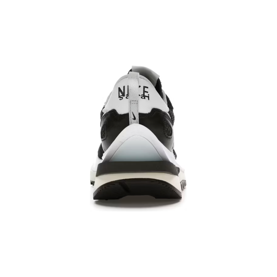 Nike Vaporwaffle sacai Black White by Nike in Shoes. Available at KershKicks for £950.00. A must-have for fans of Nike looking to elevate their style with this Shoes.