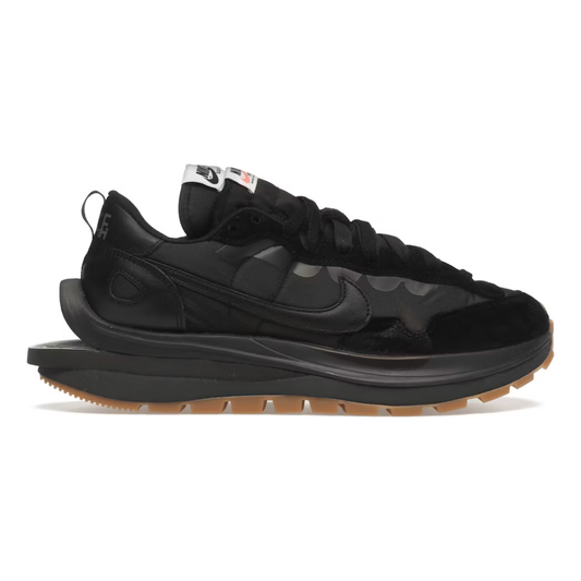 Nike Vaporwaffle Sacai Black Gum by Nike in Shoes. Available at KershKicks for £450.00. A must-have for fans of Nike looking to elevate their style with this Shoes.