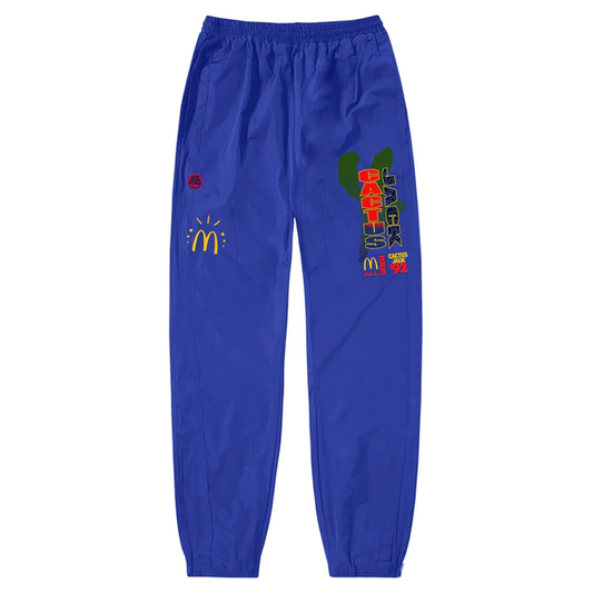 Travis Scott x McDonald's All American '92 II Nylon Pants Blue by Travis Scott in Sweatpants. Available at KershKicks for £185.00. A must-have for fans of Travis Scott looking to elevate their style with this Sweatpants.