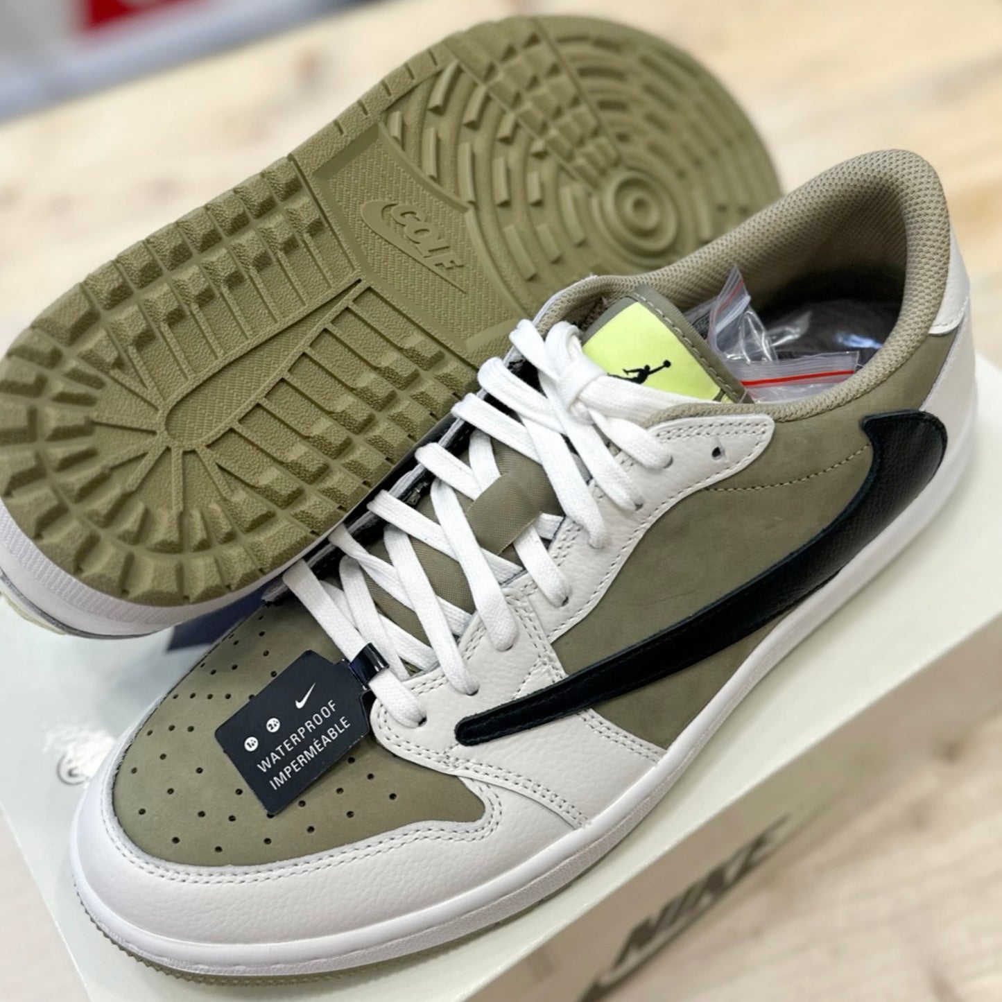 Travis Scott Air Jordan 1 Low Golf Olive Black by Travis Scott in Shoes. Available at KershKicks for £1100.00. A must-have for fans of Travis Scott looking to elevate their style with this Shoes.