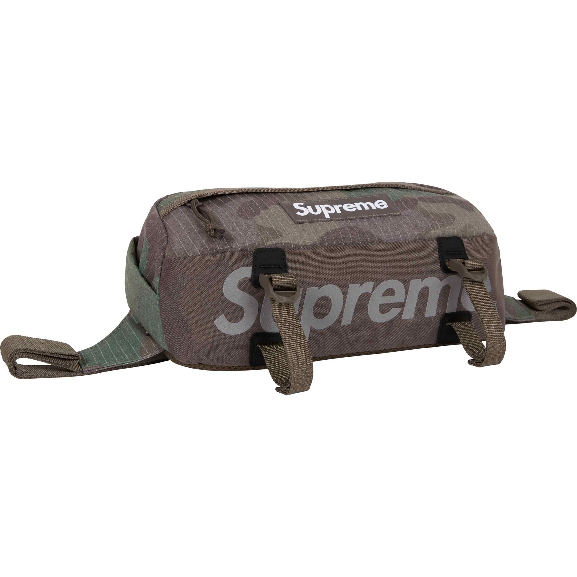 Supreme Waist Bag Woodland Camo SS24 by Supreme in Handbags, Wallets & Cases. Available at KershKicks for £115.00. A must-have for fans of Supreme looking to elevate their style with this Bag.