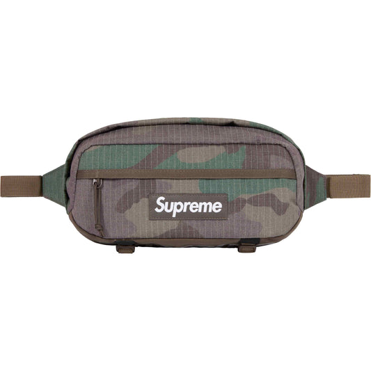 Supreme Waist Bag Woodland Camo SS24 by Supreme in Handbags, Wallets & Cases. Available at KershKicks for £115.00. A must-have for fans of Supreme looking to elevate their style with this Bag.