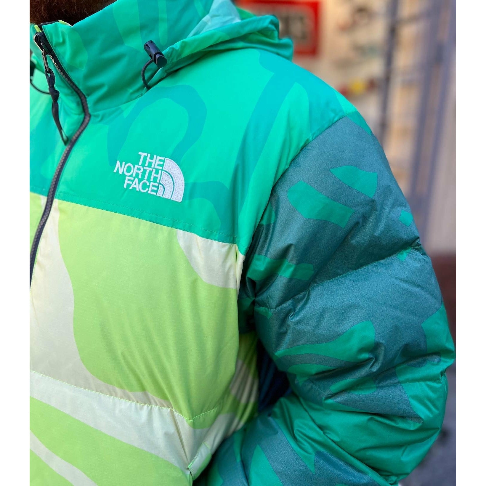 KAWS x The North Face Retro 1996 Nuptse Jacket Safety Green | Kaws