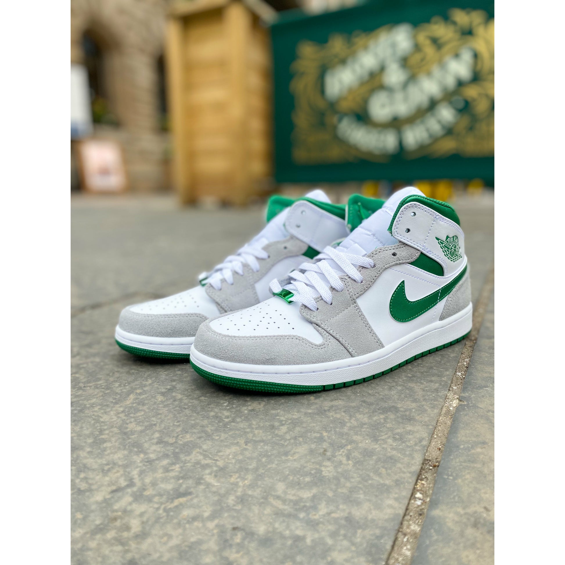 Jordan 1 Mid Grey Green by Jordan's in Shoes. Available at KershKicks for £185.00. A must-have for fans of Jordan's looking to elevate their style with this Shoes.