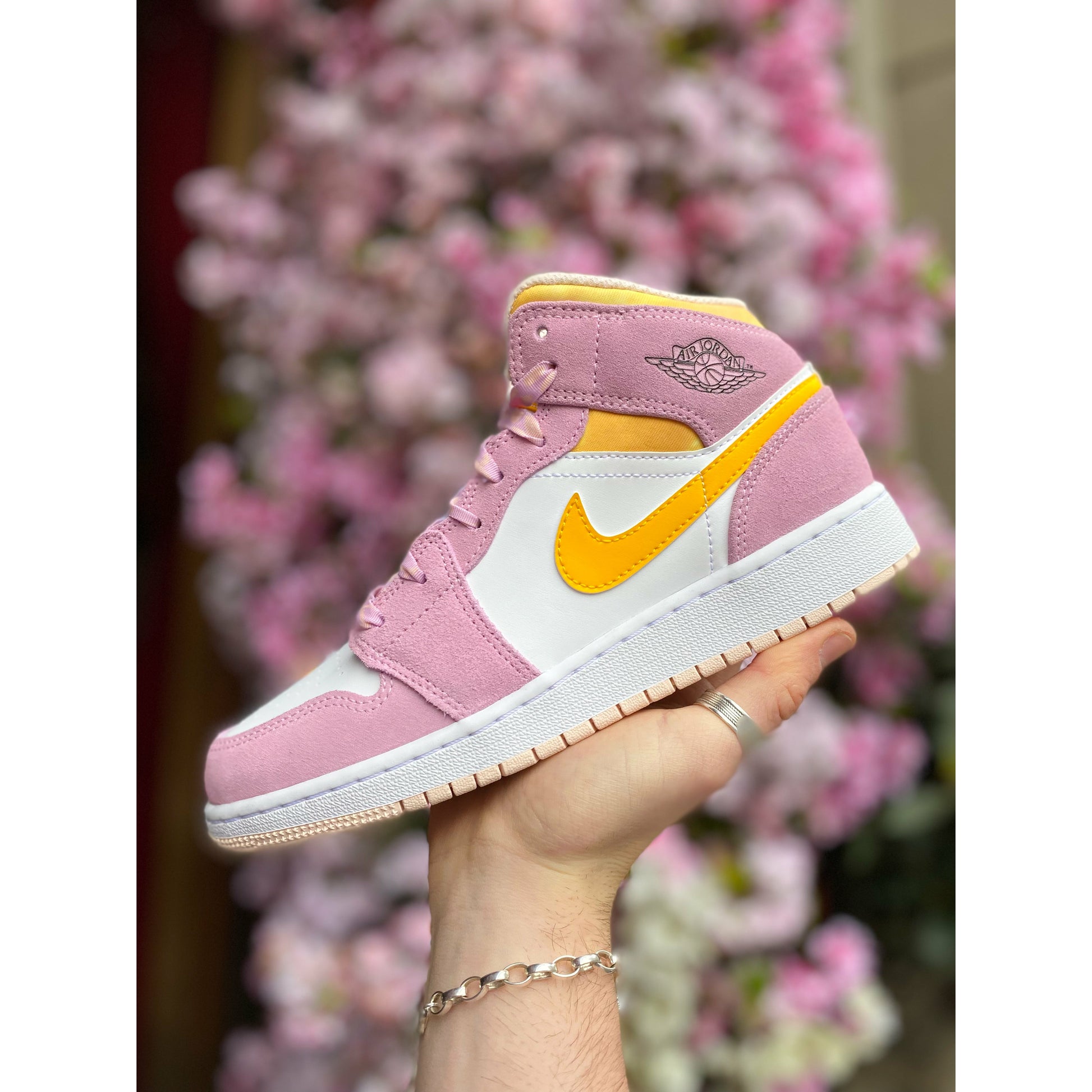 Jordan 1 Mid SE GS Arctic Pink Cherry Blossom by Jordan's in Shoes. Available at KershKicks for £100.00. A must-have for fans of Jordan's looking to elevate their style with this Shoes.